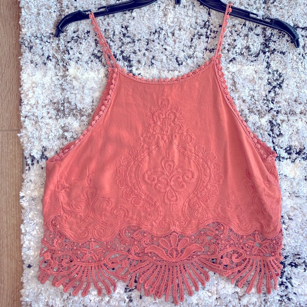 Pink high neck crop tank top with cutouts